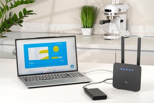 Маршрутизатор TCL LINKHUB (HH42CV2) LTE, Wi-Fi4, 1xFE LAN/WAN, 1xFE LAN, 2xSMA, Чорний + Power Bank 20000мА&middot;год + USB-DC кабель 5В-12В (694743657296) [104705]